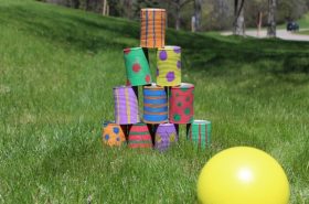 Homemade bowling setup outdoors for kids