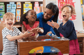 Teacher with Children at New Horizon Academy