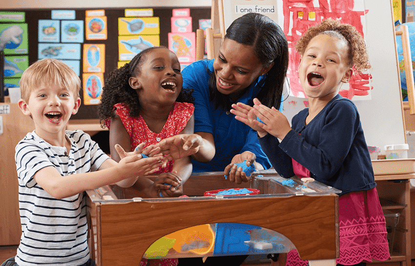 Teacher with Children at New Horizon Academy