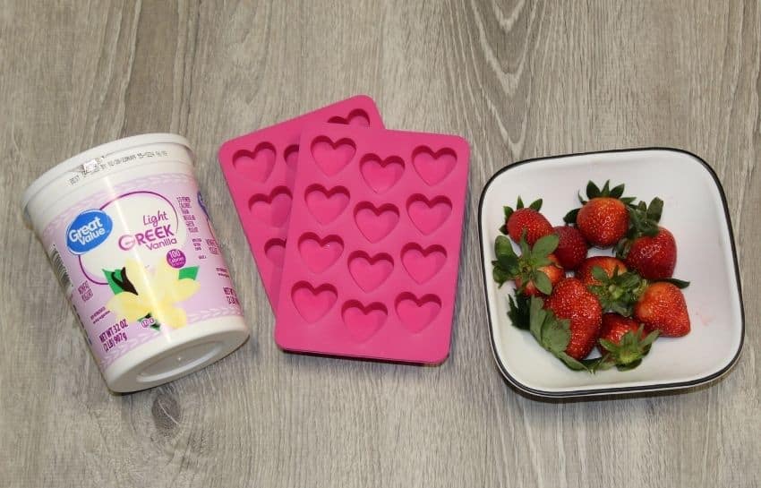 Greek yogurt, Valentine's Day heart shape molds, and strawberries