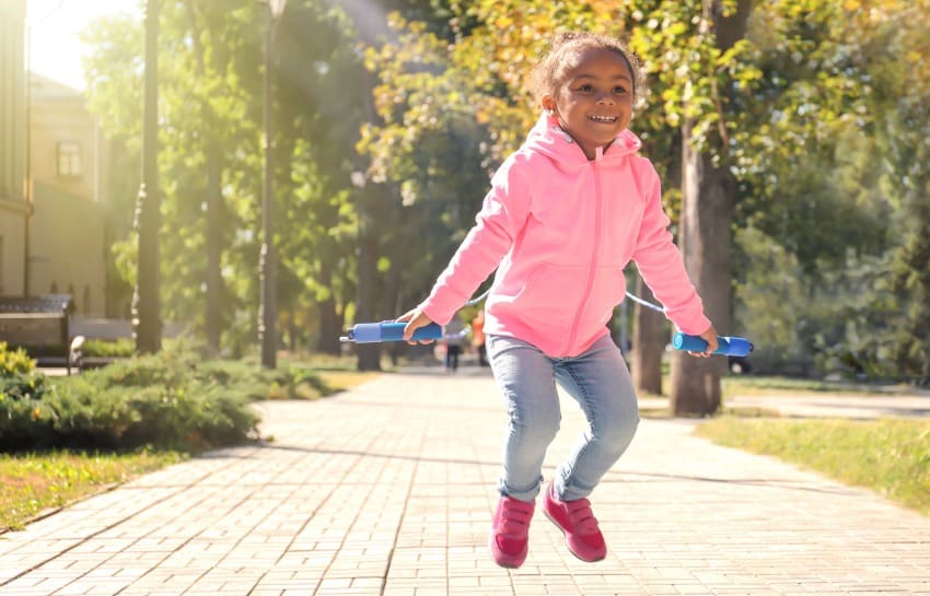 Young Girl Jumping Rope