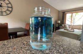 food coloring dilating in glass jar