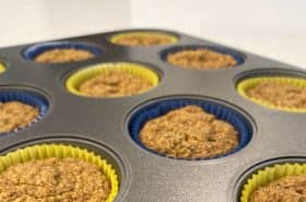 carrot apple muffins in muffin tin