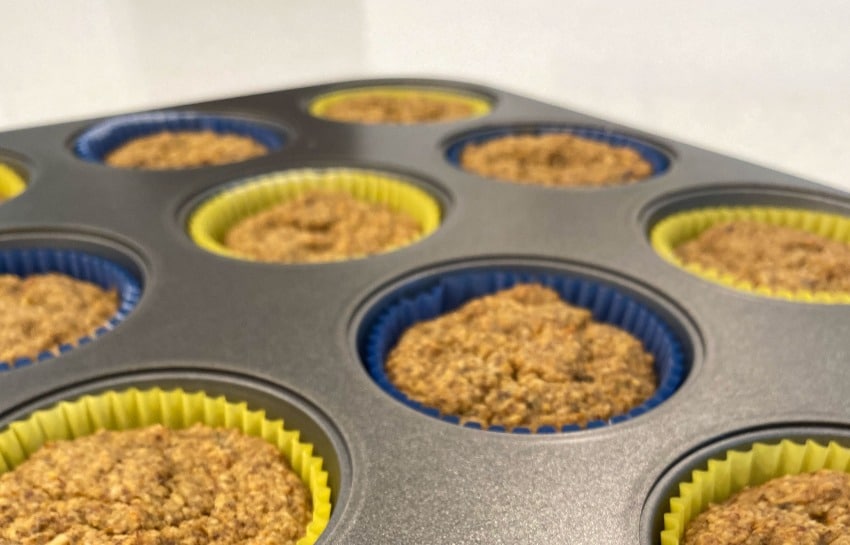 carrot apple muffins in muffin tin