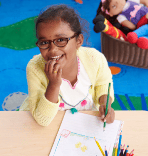 http://Daycare%20student%20drawing%20a%20picture
