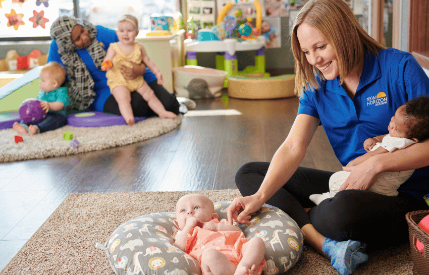 Infant teachers caring for infants