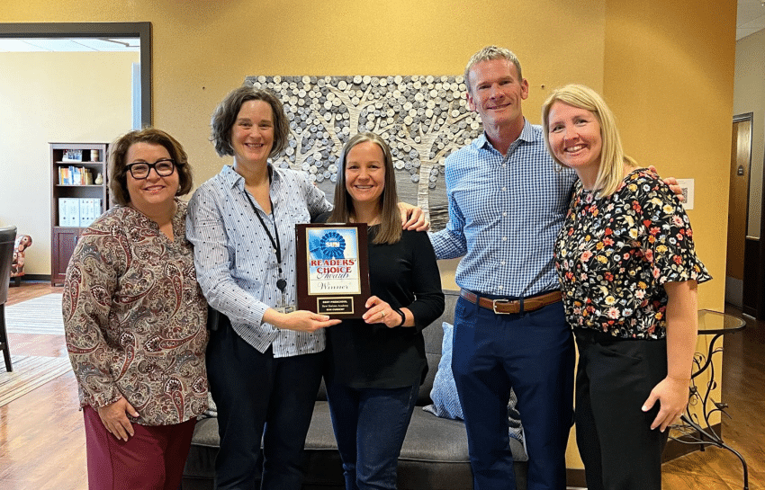 Chad Dunkley and New Horizon Academy corporate office staff deliver Readers Choice Award plaque to Richfield Best Buy school