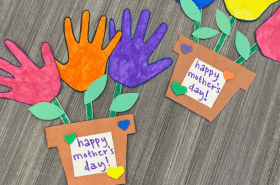 construction paper flower pots and handprint flowers for children's happy mother's day craft