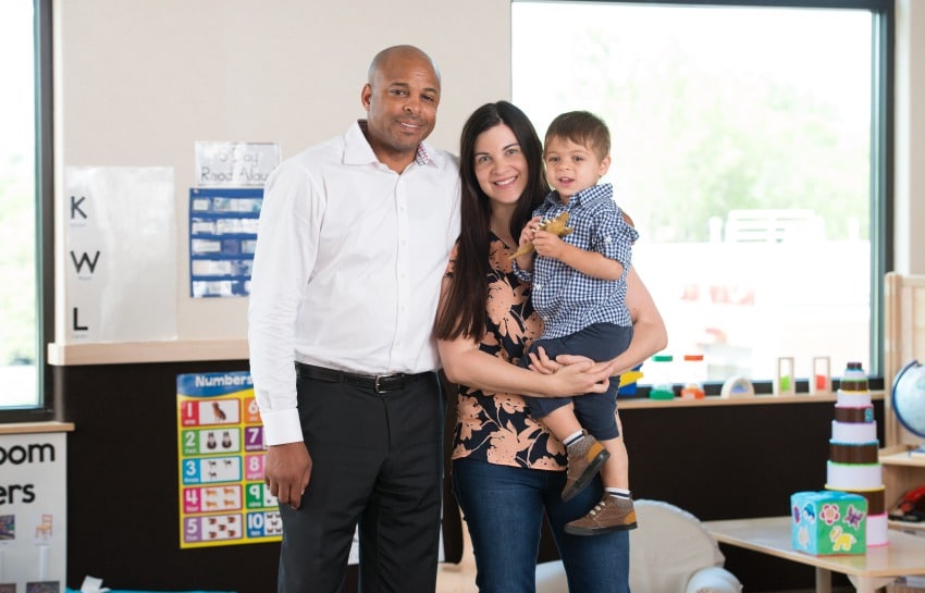 working parents dropping their toddler son off at New Horizon Academy daycare near their work