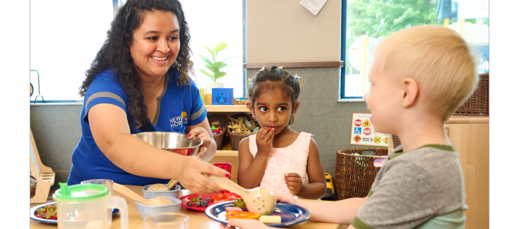 http://Early%20childhood%20teacher%20serving%20healthy%20vegetables%20to%20a%20group%20of%20preschoolers%20as%20they%20eat%20during%20school%20lunch%20time